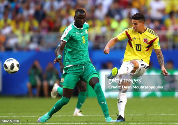 James Rodriguez of Colombia under pressure from Cheikhou Kouyate of Senegal during the 2018 FIFA World Cup Russia group H match between Senegal and...