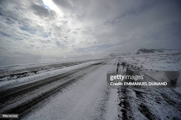 Volcanic ash leaves dark streaks on the Myrdalsjokull glacier, which is part of the ice cap sealing the Katla volcano, near the Icelandic village of...