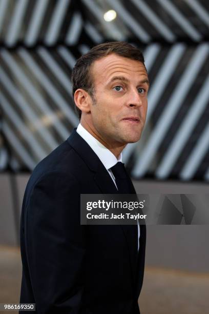 French President Emmanuel Macron arrives at the Council of the European Union on the first day of the European Council leaders' summit on June 28,...