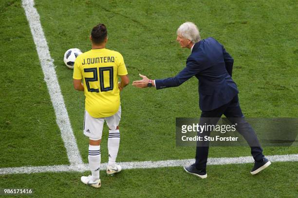 Jose Pekerman, Head coach of Colombia gives instructions to Juan Quintero to the 2018 FIFA World Cup Russia group H match between Senegal and...