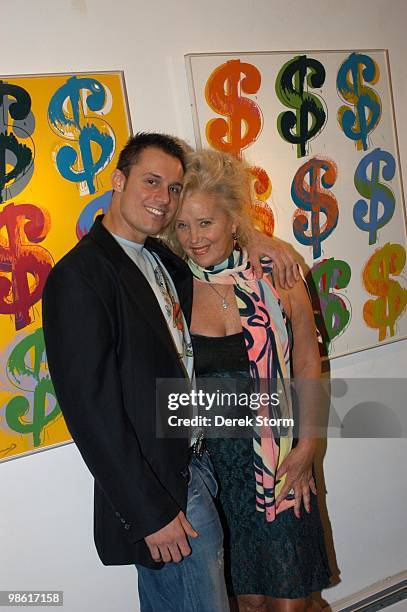 Keith Collins and Sally Kirkland in front of a Warhol