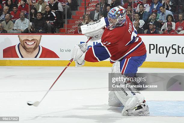 Carey Price of Montreal Canadiens takes a shot in the Game Three of the Eastern Conference Quarterfinals against the Washington Capitals during the...