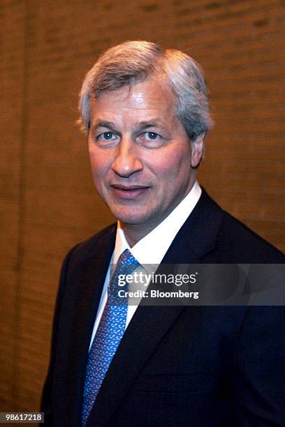 Jamie Dimon, chairman and chief executive officer of JPMorgan Chase & Co., leaves the Fairmont Chicago hotel after a luncheon speech in Chicago,...