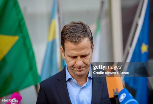 June 2018, Germany, Frankfurt am Main: Oliver Bierhoff, business manager of the Germany football team, speaking during a press statement in the VIP...