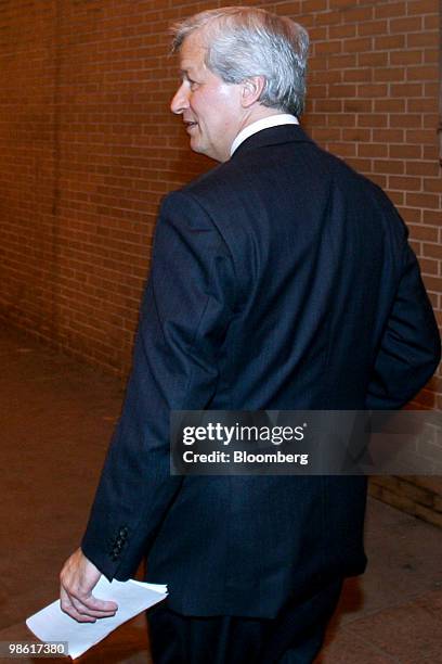 Jamie Dimon, chairman and chief executive officer of JPMorgan Chase & Co., leaves the Fairmont Chicago hotel after a luncheon speech in Chicago,...