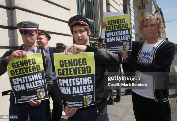 Right wing Flemisch students show posters for the separation of Belgium near the Belgian Federal Parliament on April 22, 2010 in Brussels, Belgium....