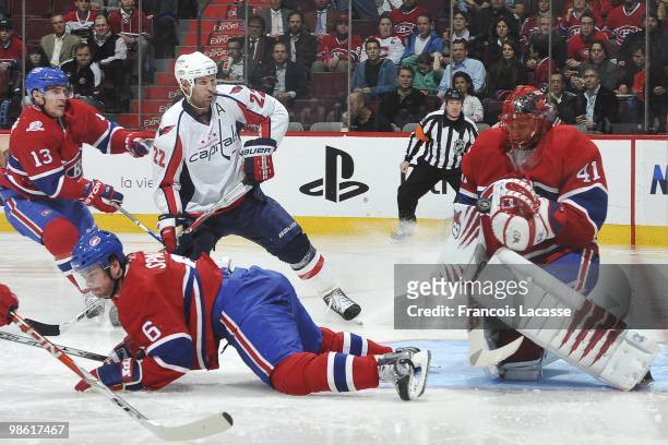 Jaroslav Halak of Montreal Canadiens blocks a shot of Mike Knuble of the Washington Capitals in the Game Three of the Eastern Conference...
