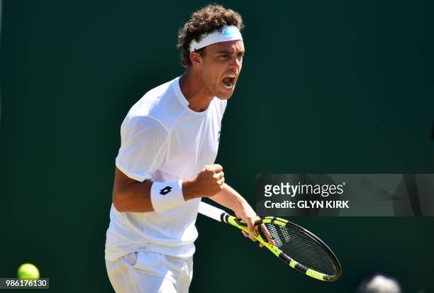 Italy's Marco Cecchinato reacts during his men's singles quarter final victory over Australia's John Millman at the ATP Nature Valley International...