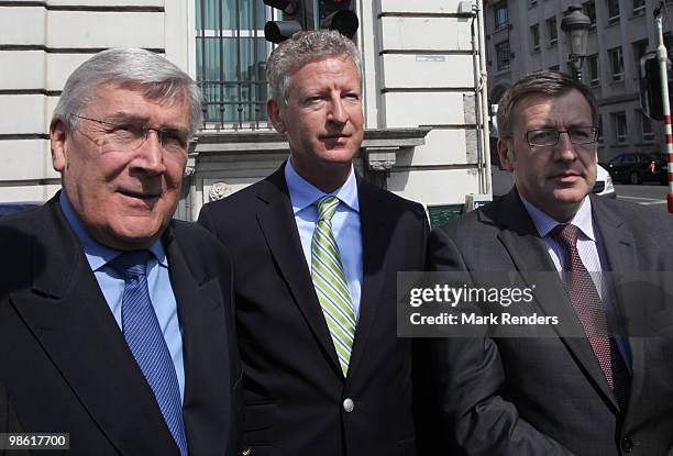 Minister of State Etienne Schouppe and Defence Minister Pieter De Crem and Foreighn Minister Steven Van Ackere talk to the media at the Belgian...