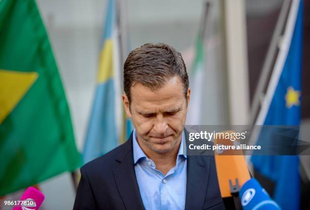 June 2018, Germany, Frankfurt am Main: Oliver Bierhoff, business manager of the Germany football team, speaking during a press statement in the VIP...