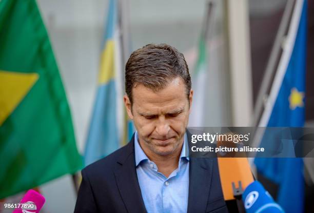 June 2018, Germany, Frankfurt am Main: Oliver Bierhoff, business manager of the Germany football team, speaking during a press statement in the VIP...