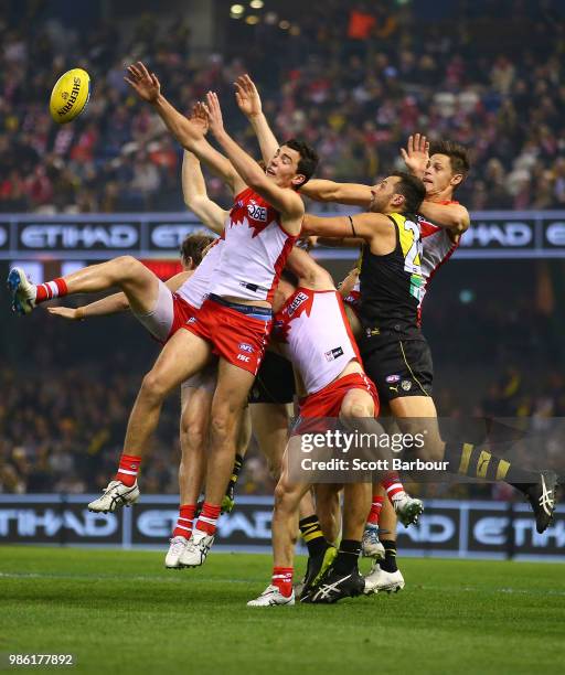 Toby Nankervis of the Tigers and Tom McCartin of the Swans compete for the ball during the round 15 AFL match between the Richmond Tigers and the...