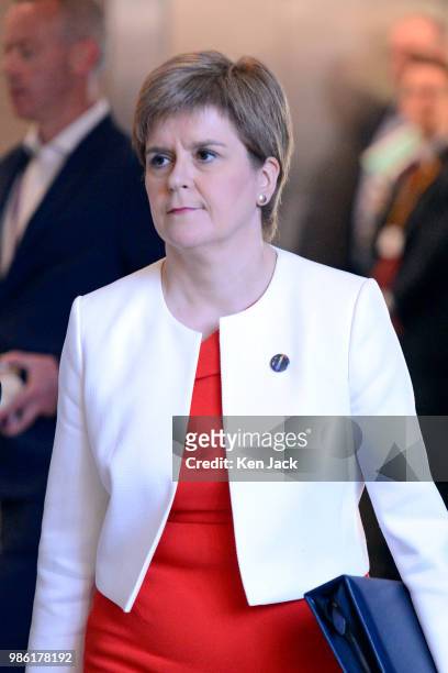 Scotland's First Minister Nicola Sturgeon on the way to First Minister's Questions in the Scottish Parliament, on June 28, 2018 in Edinburgh,...
