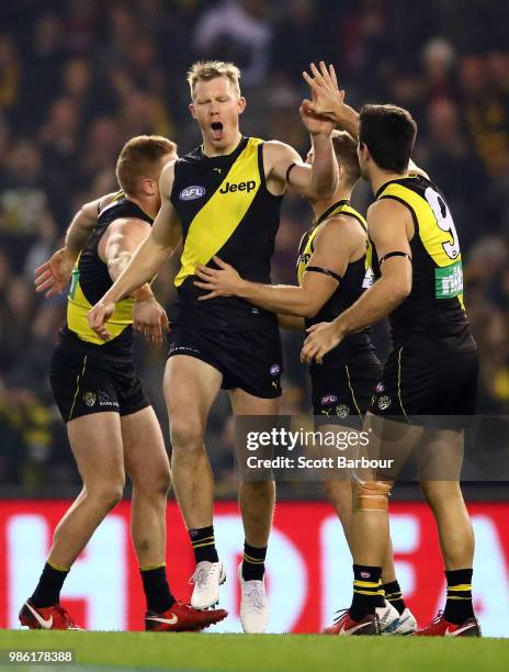 Jack Riewoldt of the Tigers celebrates after kicking a goal during the round 15 AFL match between the Richmond Tigers and the Sydney Swans at Etihad...