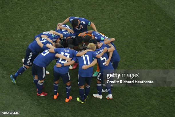 Japan form a huddle prior to the 2018 FIFA World Cup Russia group H match between Japan and Poland at Volgograd Arena on June 28, 2018 in Volgograd,...