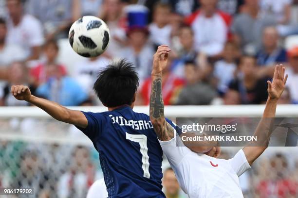 Japan's midfielder Gaku Shibasaki vies with Poland's midfielder Jacek Goralski during the Russia 2018 World Cup Group H football match between Japan...