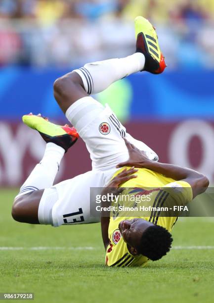 Yerry Mina of Colombia goes down injured during the 2018 FIFA World Cup Russia group H match between Senegal and Colombia at Samara Arena on June 28,...
