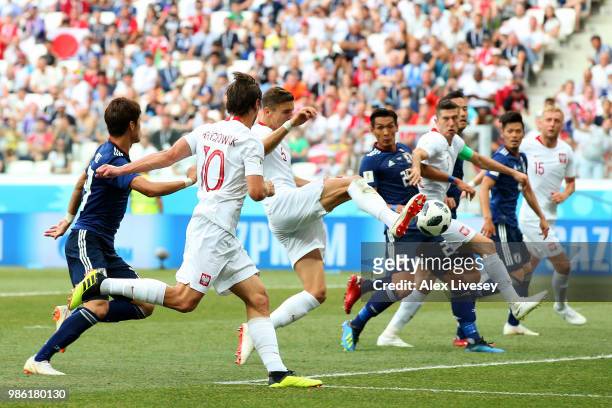 Jan Bednarek of Poland scores his team's first goal during the 2018 FIFA World Cup Russia group H match between Japan and Poland at Volgograd Arena...
