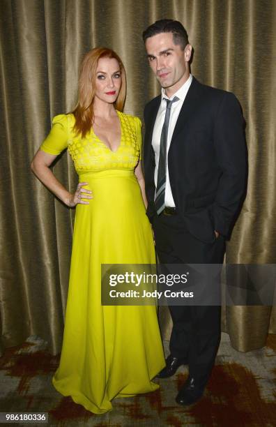 Actress Annie Wersching and actor Sam Witwer pose backstage at the Academy Of Science Fiction, Fantasy & Horror Films' 44th Annual Saturn Awards held...