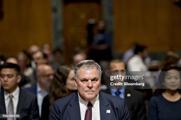 Charles Rettig, commissioner of the Internal Revenue Service nominee for U.S. President Donald Trump, waits to begin a Senate Finance Committee...