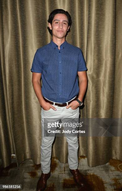 Actor Lorenzo James Henrie poses backstage at the Academy Of Science Fiction, Fantasy & Horror Films' 44th Annual Saturn Awards held at The Castaway...