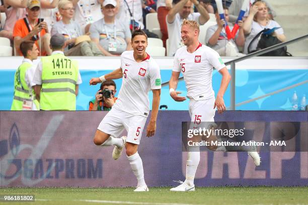 Jan Bednarek of Poland celebrates scoring a goal to make it 0-1 with Kamil Glik of Poland during the 2018 FIFA World Cup Russia group H match between...