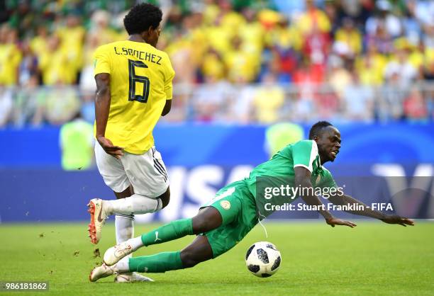 Sadio Mane of Senegal is challenged by Carlos Sanchez of Colombia during the 2018 FIFA World Cup Russia group H match between Senegal and Colombia at...