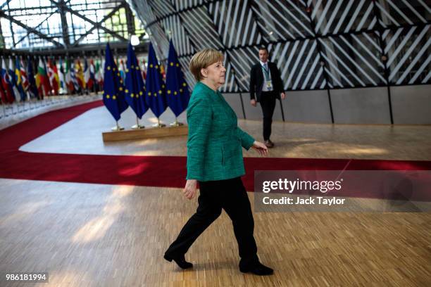 German Chancellor Angela Merkel arrives at the Council of the European Union on the first day of the European Council leaders' summit on June 28,...