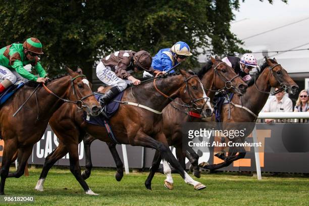 Ryan Moore riding Aces win The 188Bet Mobile Bet10 Get20 Handicap Stakes at Newmarket Racecourse on June 28, 2018 in Newmarket, United Kingdom.