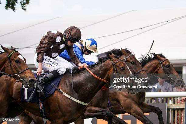 Ryan Moore riding Aces win The 188Bet Mobile Bet10 Get20 Handicap Stakes at Newmarket Racecourse on June 28, 2018 in Newmarket, United Kingdom.