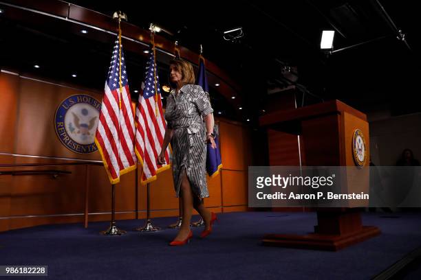 House Minority Leader Nancy Pelosi departs after addressing reporters at her weekly news conference on Capitol Hill June 28, 2018 in Washington, DC....