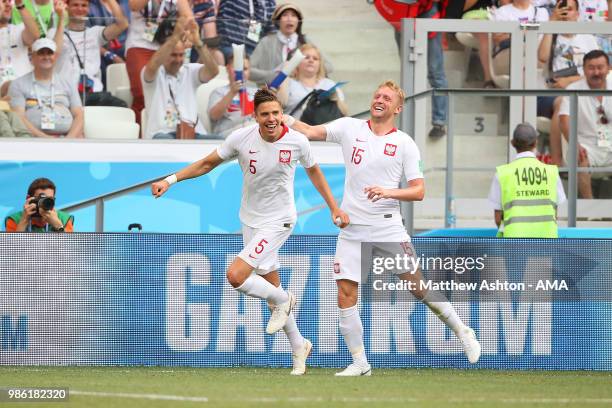Jan Bednarek of Poland celebrates scoring a goal to make it 0-1 with Kamil Glik of Poland during the 2018 FIFA World Cup Russia group H match between...