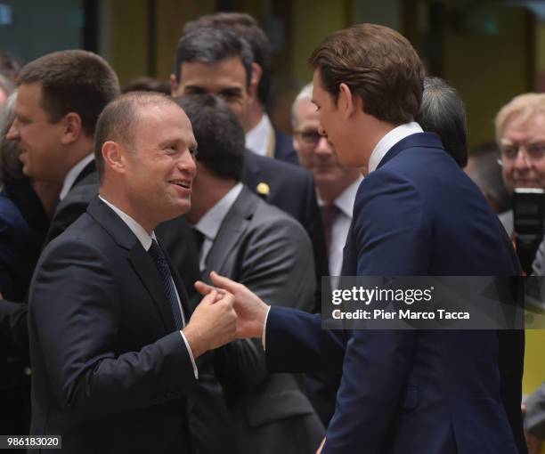 Joseph Muscat, Prime Minister of Malta speaks with Sebastian Kurz, Federal Chancellor of Austria during the EU Council Meeting at European Parliament...