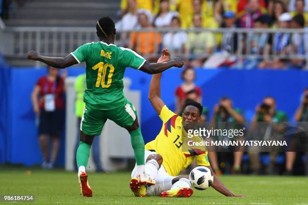 Senegal's forward Sadio Mane vies for the ball with Colombia's defender Yerry Mina during the Russia 2018 World Cup Group H football match between...