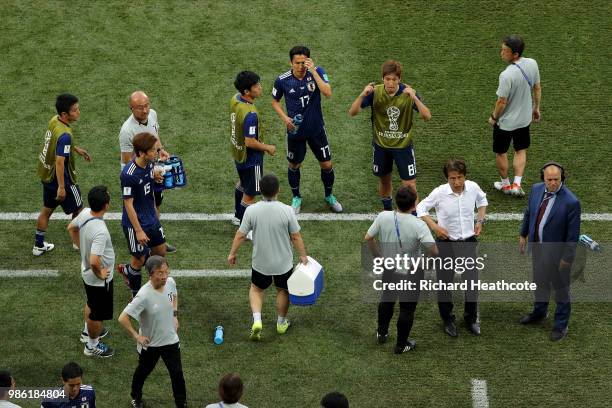 Japan team players and coachreacts during the 2018 FIFA World Cup Russia group H match between Japan and Poland at Volgograd Arena on June 28, 2018...