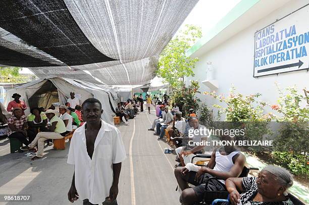 Haitians wait for medical aid at a clinic set up by the Medecins sans Frontieres organization in Cite Soleil on April 22, 2010. MSF is reporting that...