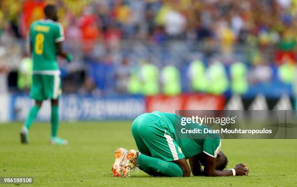 Salif Sane of Senegal looks dejected following his sides defeat in the 2018 FIFA World Cup Russia group H match between Senegal and Colombia at...