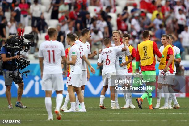 Poland players react following the 2018 FIFA World Cup Russia group H match between Japan and Poland at Volgograd Arena on June 28, 2018 in...