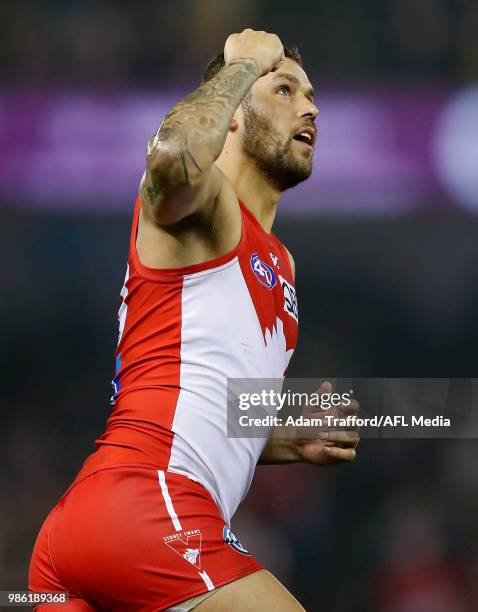 Lance Franklin of the Swans celebrates a goal during the 2018 AFL round 15 match between the Richmond Tigers and the Sydney Swans at Etihad Stadium...