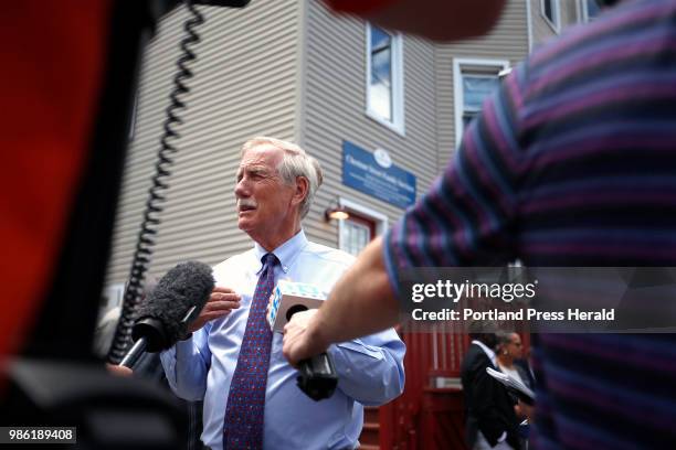 Sen. Angus King talks to reporters during a tour or the Bayside neighborhood on Friday. King made stops at City of Portland Family Shelter, Oxford...