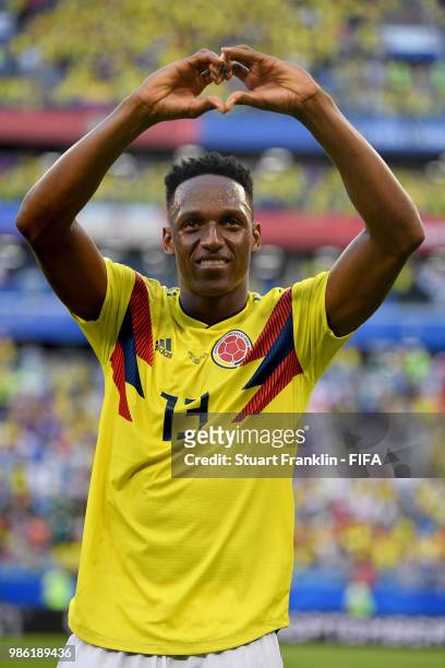 Yerry Mina of Colombia shows appreciation to the fans following his sides victory in the 2018 FIFA World Cup Russia group H match between Senegal and...