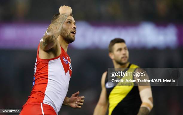 Lance Franklin of the Swans celebrates a goal during the 2018 AFL round 15 match between the Richmond Tigers and the Sydney Swans at Etihad Stadium...