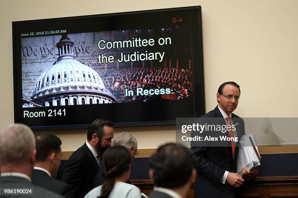 Deputy Attorney General Rod Rosenstein leaves for a break during a hearing before the House Judiciary Committee June 28, 2018 on Capitol Hill in...