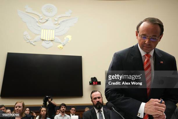 Deputy Attorney General Rod Rosenstein takes his seat during a hearing before the House Judiciary Committee June 28, 2018 on Capitol Hill in...