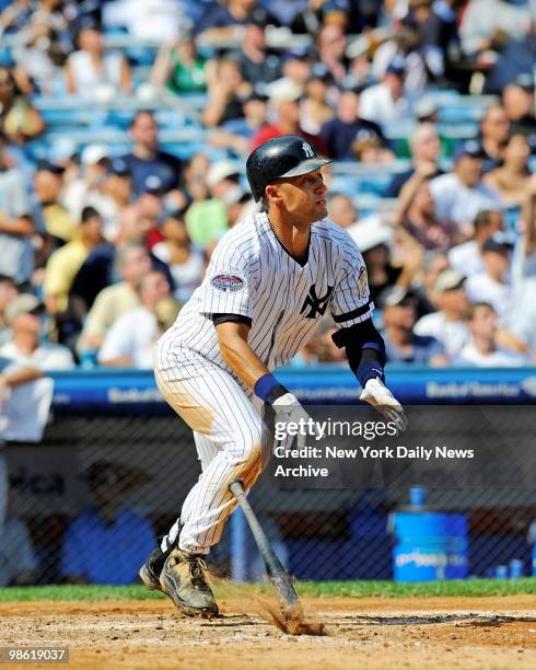 Derek Jeter of the New York Yankees gets his third hit of the game, a home run in the 5th inning, to tie Lou Gehrig for the most hits all time at...