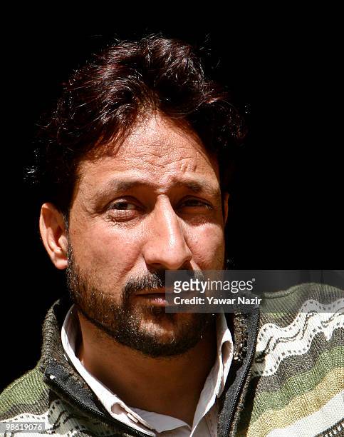 Mohammad Maqbool Shah poses for a picture after being acquitted by a session court in India's capital New Delhi at his home on April 22, 2010 in...