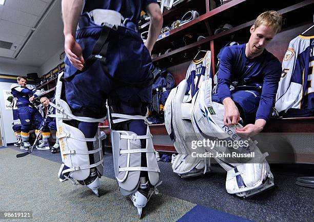 Pekka Rinne of the Nashville Predators straps on the pads in the locker room in Game Three of the Western Conference Quarterfinals against the...