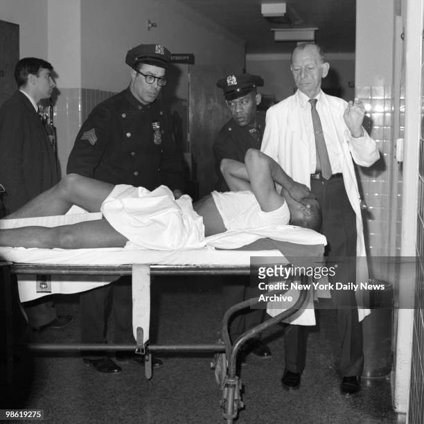 Talmadge Hayer, aka Thomas Hagan, in Jewish Memorial Hospital after killing of Malcolm X on February 21, 1965 in New York City. Hayer was wounded in...