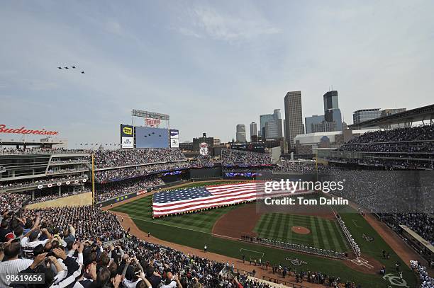 Overall view of Target Field as F-16s from the 148th Fighter Wing of the Minnesota Air National Guard perform flyover before Minnesota Twins vs...