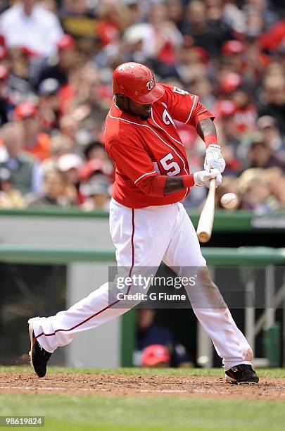 Cristian Guzman of the Washington Nationals bats against the Milwaukee Brewers April 18, 2010 at Nationals Park in Washington, DC.